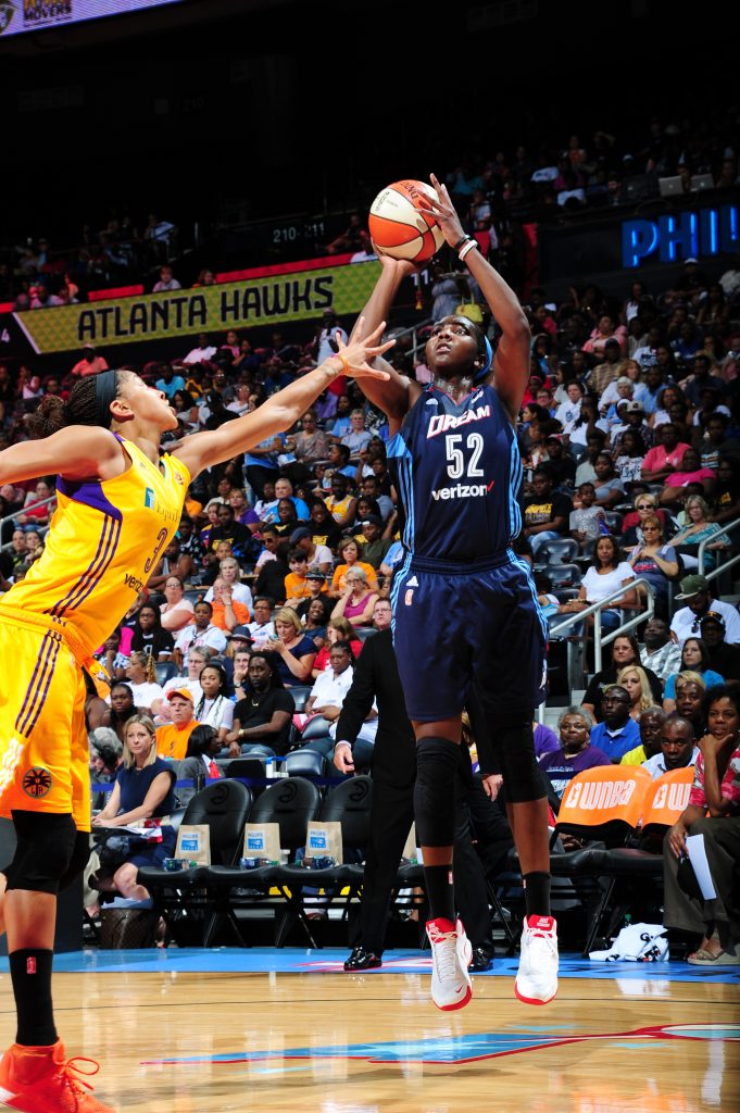 ATLANTA, GA - JULY 17: Elizabeth Williams #52 of the Atlanta Dream shoots the ball against Candace Parker #3 of the Los Angeles Sparks on July 17, 2016 at Philips Arena in Atlanta, Georgia. NOTE TO USER: User expressly acknowledges and agrees that, by downloading and/or using this Photograph, user is consenting to the terms and conditions of the Getty Images License Agreement. Mandatory Copyright Notice: Copyright 2016 NBAE (Photo by Scott Cunningham/NBAE via Getty Images)