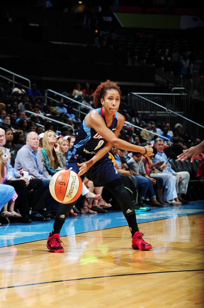 ATLANTA, GA - JULY 17: Carla Cortijo #8 of the Atlanta Dream handles the ball against the Los Angeles Sparks on July 17, 2016 at Philips Arena in Atlanta, Georgia. NOTE TO USER: User expressly acknowledges and agrees that, by downloading and/or using this Photograph, user is consenting to the terms and conditions of the Getty Images License Agreement. Mandatory Copyright Notice: Copyright 2016 NBAE (Photo by Scott Cunningham/NBAE via Getty Images)