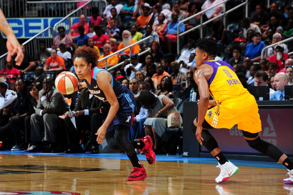 ATLANTA, GA - JULY 17: Carla Cortijo #8 of the Atlanta Dream drives to the basket against the Los Angeles Sparks on July 17, 2016 at Philips Arena in Atlanta, Georgia. NOTE TO USER: User expressly acknowledges and agrees that, by downloading and/or using this Photograph, user is consenting to the terms and conditions of the Getty Images License Agreement. Mandatory Copyright Notice: Copyright 2016 NBAE (Photo by Scott Cunningham/NBAE via Getty Images)