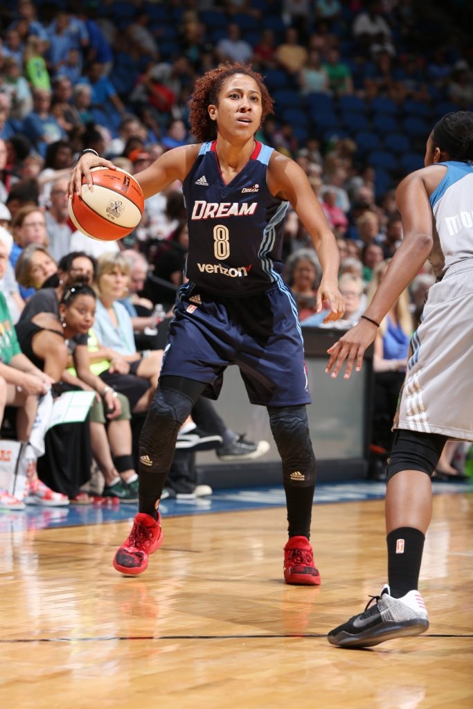 MINNEAPOLIS, MN - JULY 20: Carla Cortijo #8 of the Atlanta Dream handles the ball against the Minnesota Lynx on July 20, 2016 at Target Center in Minneapolis, Minnesota. NOTE TO USER: User expressly acknowledges and agrees that, by downloading and or using this Photograph, user is consenting to the terms and conditions of the Getty Images License Agreement. Mandatory Copyright Notice: Copyright 2016 NBAE (Photo by David Sherman/NBAE via Getty Images)