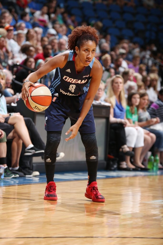 MINNEAPOLIS, MN - JULY 20: Carla Cortijo #8 of the Atlanta Dream handles the ball against the Minnesota Lynx on July 20, 2016 at Target Center in Minneapolis, Minnesota. NOTE TO USER: User expressly acknowledges and agrees that, by downloading and or using this Photograph, user is consenting to the terms and conditions of the Getty Images License Agreement. Mandatory Copyright Notice: Copyright 2016 NBAE (Photo by David Sherman/NBAE via Getty Images)