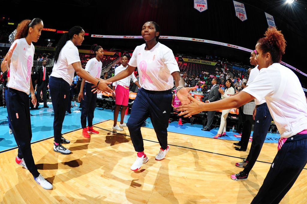 ATLANTA, GA - AUGUST 28: Elizabeth Williams #52 of the Atlanta Dream is introduced before the game against the Connecticut Sun on August 28, 2016 at Philips Arena in Atlanta, Georgia. NOTE TO USER: User expressly acknowledges and agrees that, by downloading and/or using this Photograph, user is consenting to the terms and conditions of the Getty Images License Agreement. Mandatory Copyright Notice: Copyright 2016 NBAE (Photo by Scott Cunningham/NBAE via Getty Images)
