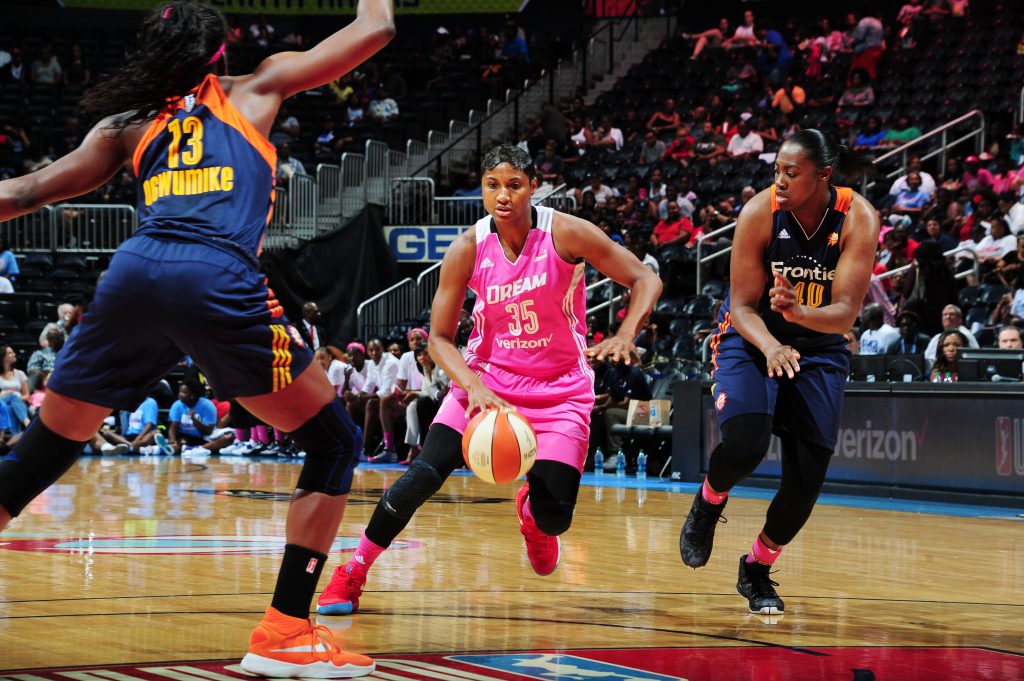 ATLANTA, GA - AUGUST 28: Angel McCoughtry #35 of the Atlanta Dream handles the ball against the Connecticut Sun on August 28, 2016 at Philips Arena in Atlanta, Georgia. NOTE TO USER: User expressly acknowledges and agrees that, by downloading and/or using this Photograph, user is consenting to the terms and conditions of the Getty Images License Agreement. Mandatory Copyright Notice: Copyright 2016 NBAE (Photo by Scott Cunningham/NBAE via Getty Images)