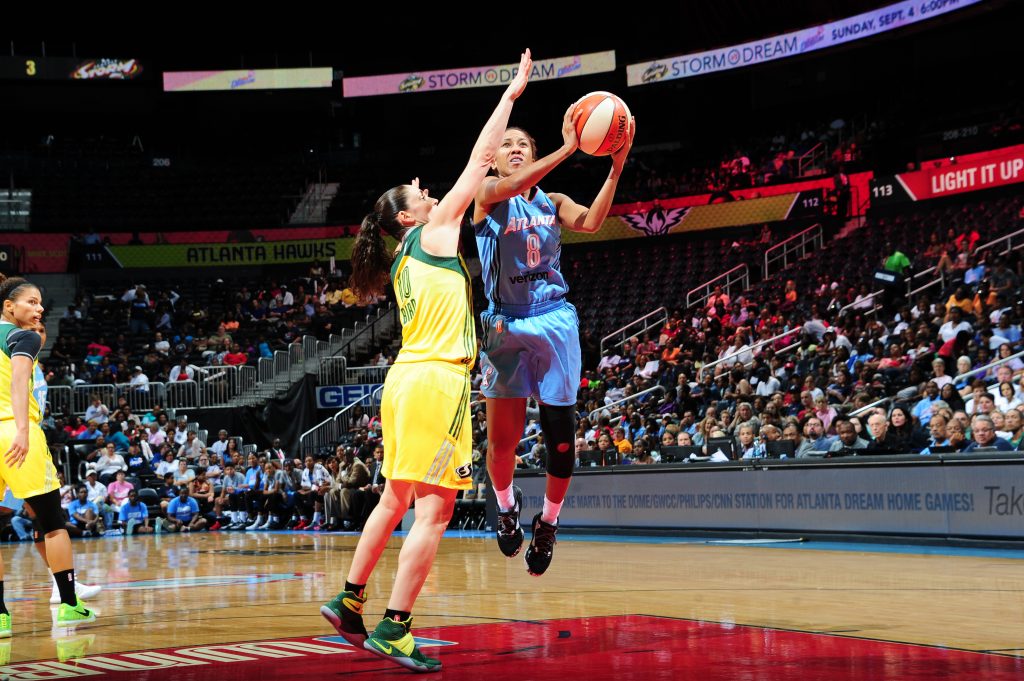 ATLANTA, GA - SEPTEMBER 4: Carla Cortijo #8 of the Atlanta Dream shoots the ball against the Seattle Storm on September 4, 2016 at Philips Arena in Atlanta, Georgia. NOTE TO USER: User expressly acknowledges and agrees that, by downloading and/or using this Photograph, user is consenting to the terms and conditions of the Getty Images License Agreement. Mandatory Copyright Notice: Copyright 2016 NBAE (Photo by Scott Cunningham/NBAE via Getty Images)