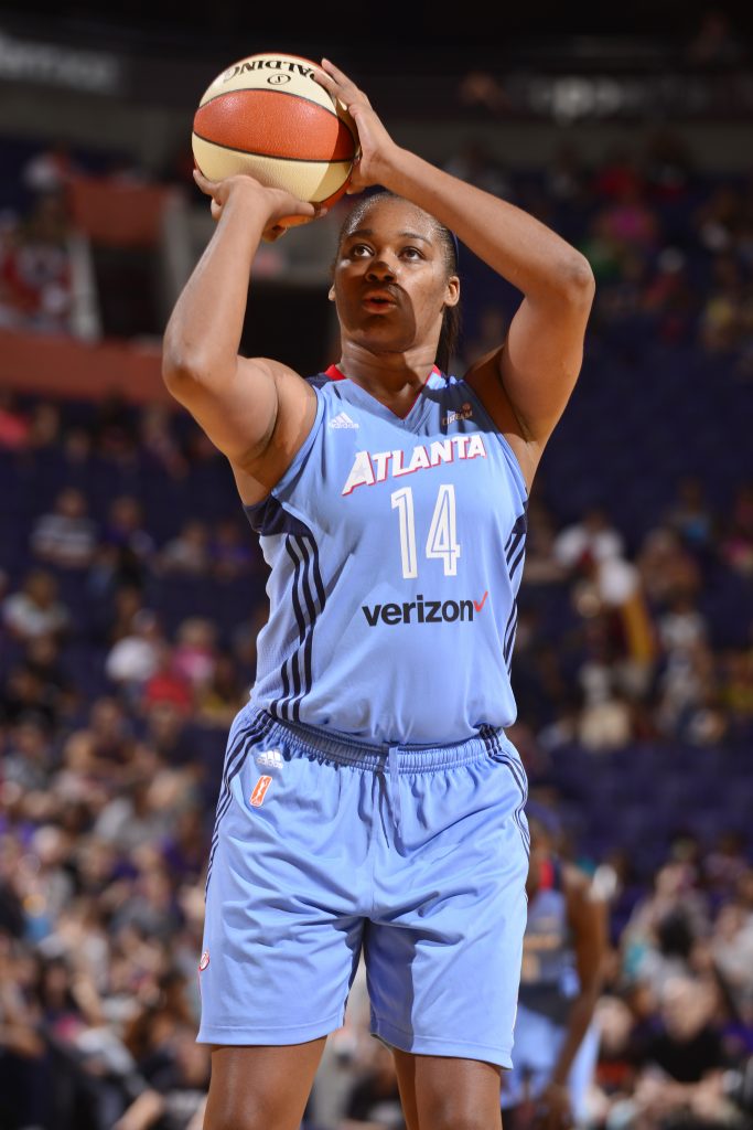 PHOENIX, AZ - SEPTEMBER 11: Rachel Hollivay #14 of the Atlanta Dream shoots a free throw against the Phoenix Mercury on September 11, 2016 at Talking Stick Resort Arena in Phoenix, Arizona. NOTE TO USER: User expressly acknowledges and agrees that, by downloading and or using this Photograph, user is consenting to the terms and conditions of the Getty Images License Agreement. Mandatory Copyright Notice: Copyright 2016 NBAE (Photo by Barry Gossage/NBAE via Getty Images)