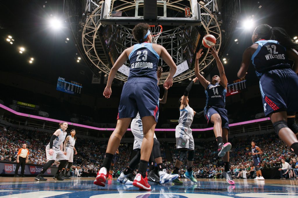 MINNEAPOLIS, MN - SEPTEMBER 17: Rachel Hollivay #14 of the Atlanta Dream shoots the ball against the Minnesota Lynx on September 17, 2016 at Target Center in Minneapolis, Minnesota. NOTE TO USER: User expressly acknowledges and agrees that, by downloading and or using this Photograph, user is consenting to the terms and conditions of the Getty Images License Agreement. Mandatory Copyright Notice: Copyright 2016 NBAE (Photo by David Sherman/NBAE via Getty Images)