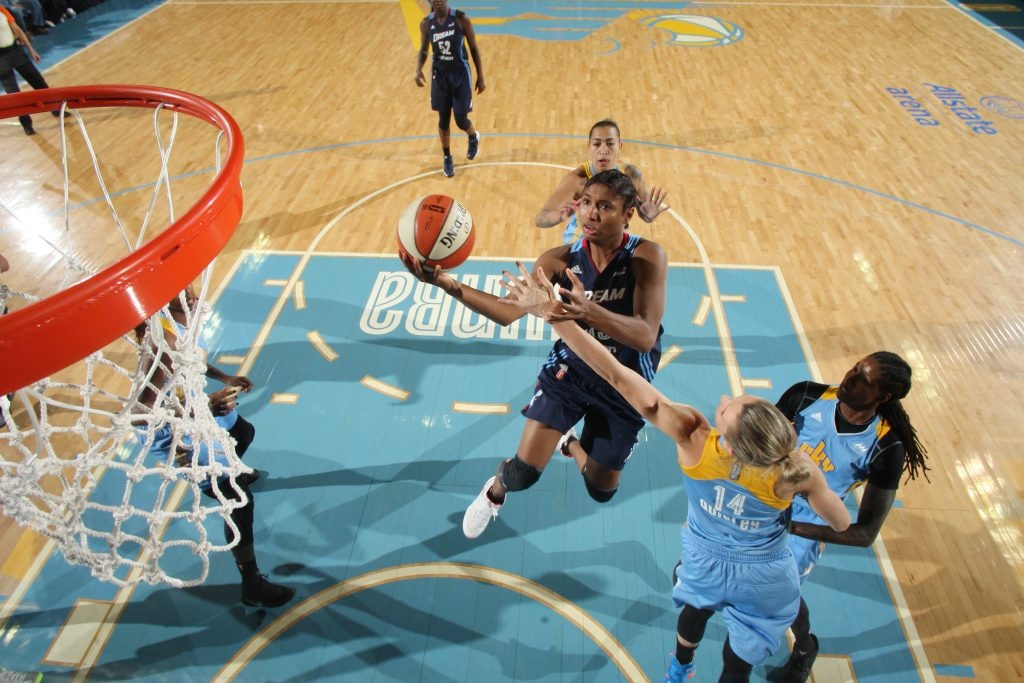 ROSEMONT, IL - SEPTEMBER 25: Angel McCoughtry #35 of the Atlanta Dream shoots a lay up against the Chicago Sky during Round Two of the 2016 WNBA Playoffs on September 25, 2016 at Allstate Arena in Rosemont, IL. NOTE TO USER: User expressly acknowledges and agrees that, by downloading and or using this photograph, User is consenting to the terms and conditions of the Getty Images License Agreement. Mandatory Copyright Notice: Copyright 2016 NBAE (Photo by Gary Dineen/NBAE via Getty Images)