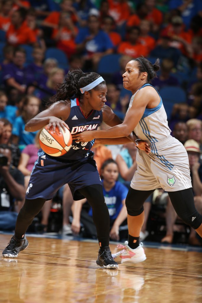MINNEAPOLIS, MN - JULY 20: Matee Ajavon #10 of the Atlanta Dream handles the ball against Jia Perkins #7 of the Minnesota Lynx on July 20, 2016 at Target Center in Minneapolis, Minnesota. NOTE TO USER: User expressly acknowledges and agrees that, by downloading and or using this Photograph, user is consenting to the terms and conditions of the Getty Images License Agreement. Mandatory Copyright Notice: Copyright 2016 NBAE (Photo by David Sherman/NBAE via Getty Images)