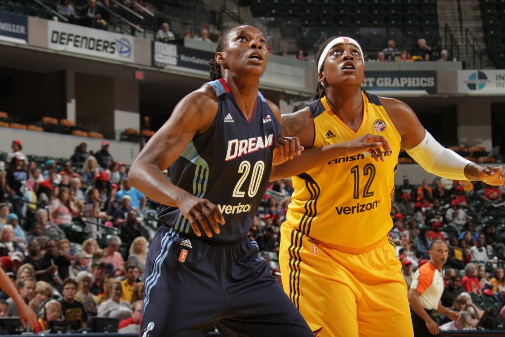 INDIANAPOLIS, IN - MAY 20: Sancho Lyttle #20 of the Atlanta Dream fights for position against Lynetta Kizer #12 of the Indiana Fever on May 20, 2016 at Bankers Life Fieldhouse in Indianapolis, Indiana. NOTE TO USER: User expressly acknowledges and agrees that, by downloading and or using this Photograph, user is consenting to the terms and conditions of the Getty Images License Agreement. Mandatory Copyright Notice: Copyright 2016 NBAE (Photo by Ron Hoskins/NBAE via Getty Images)