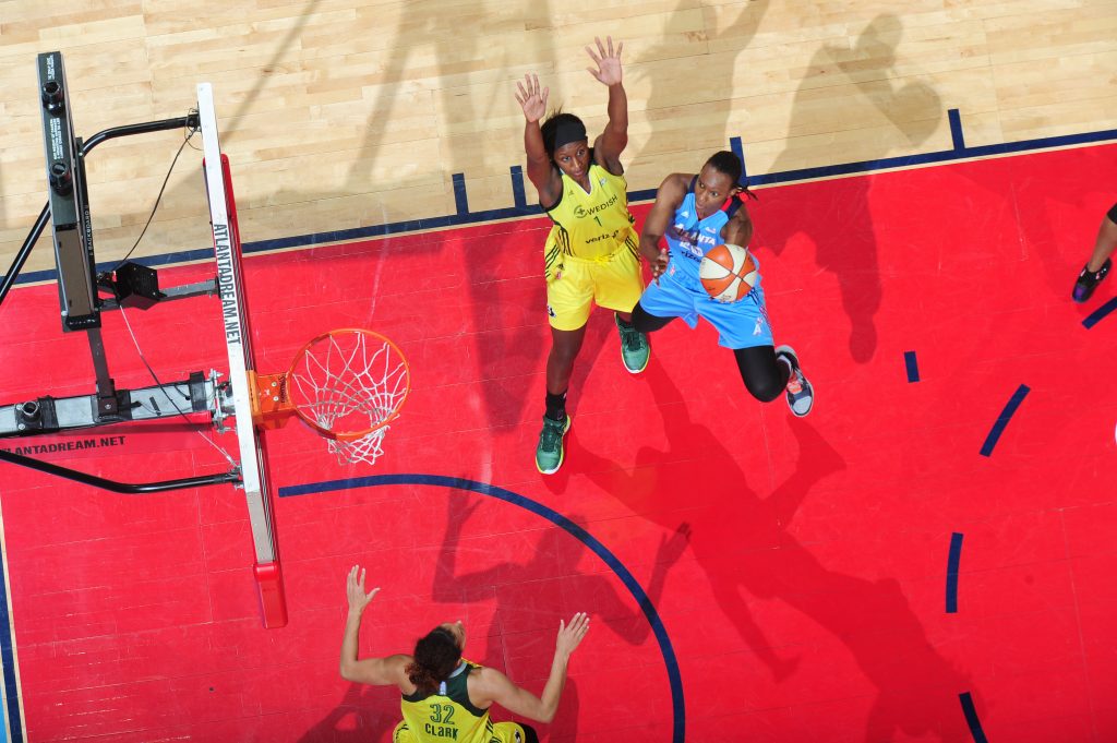 ATLANTA, GA - JULY 5: Sancho Lyttle #20 of the Atlanta Dream shoots the ball against Jewell Loyd #24 of the Seattle Storm on July 5, 2016 at Philips Arena in Atlanta, Georgia. NOTE TO USER: User expressly acknowledges and agrees that, by downloading and/or using this Photograph, user is consenting to the terms and conditions of the Getty Images License Agreement. Mandatory Copyright Notice: Copyright 2016 NBAE (Photo by Scott Cunningham/NBAE via Getty Images)