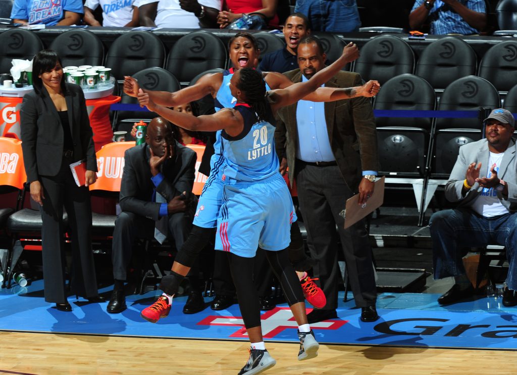 ATLANTA, GA - JULY 5: Angel McCoughtry #35 celebrates with Sancho Lyttle #20 of the Atlanta Dream during the game against the Seattle Storm on July 5, 2016 at Philips Arena in Atlanta, Georgia. NOTE TO USER: User expressly acknowledges and agrees that, by downloading and/or using this Photograph, user is consenting to the terms and conditions of the Getty Images License Agreement. Mandatory Copyright Notice: Copyright 2016 NBAE (Photo by Scott Cunningham/NBAE via Getty Images)