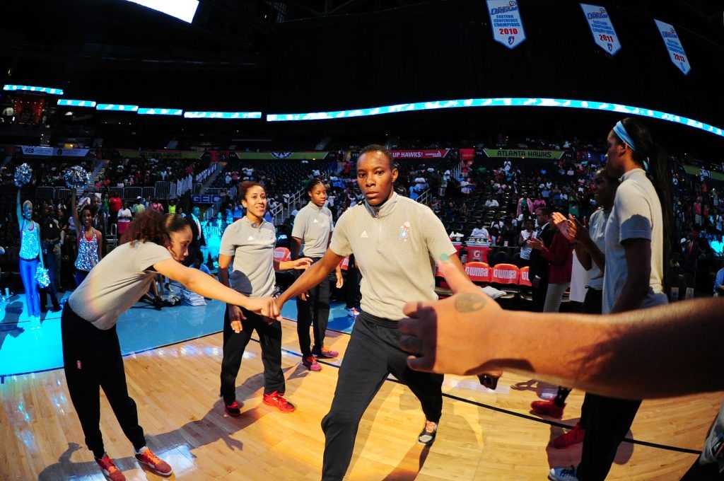ATLANTA, GA - JULY 8: Sancho Lyttle #20 of the Atlanta Dream gets introduced before the game against the Dallas Wings on July 8, 2016 at Philips Arena in Atlanta, Georgia. NOTE TO USER: User expressly acknowledges and agrees that, by downloading and/or using this Photograph, user is consenting to the terms and conditions of the Getty Images License Agreement. Mandatory Copyright Notice: Copyright 2016 NBAE (Photo by Scott Cunningham/NBAE via Getty Images)