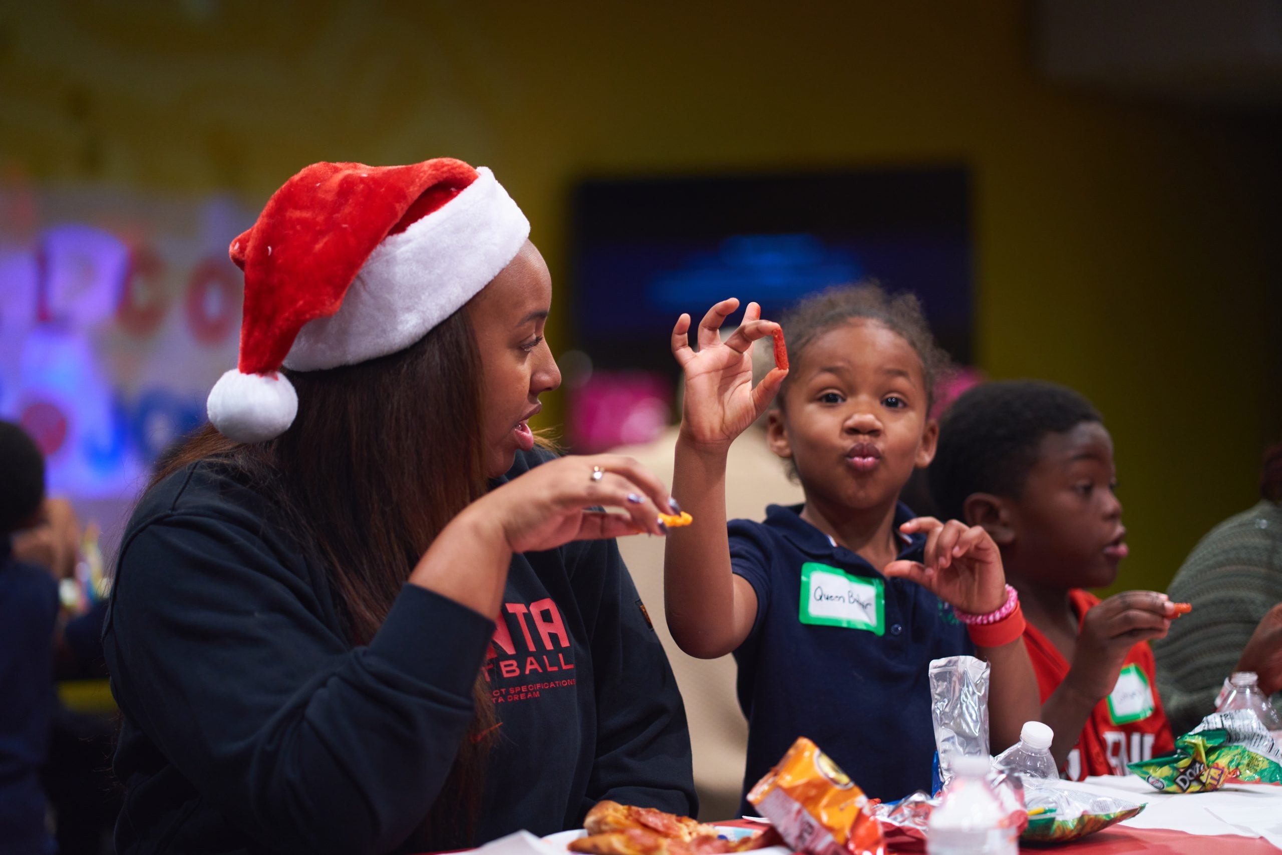 Atlanta Dream Team helping at Dreamsgiving at the Bosey Ansley School For the Homeless