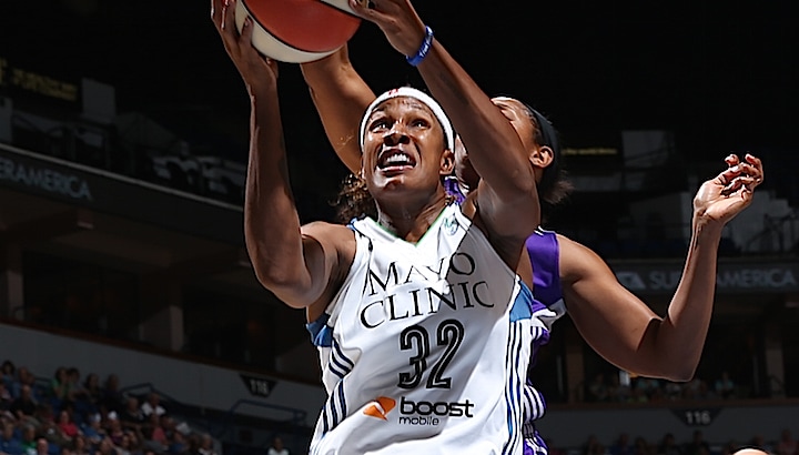 MINNEAPOLIS, MN - JUNE 27: Rebekkah Brunson #32 of the Minnesota Lynx drives to the basket against the Phoenix Mercury at the Target Center on June 27, 2015 in Minneapolis, MN. NOTE TO USER: User expressly acknowledges and agrees that, by downloading and/or using this Photograph, user is consenting to the terms and conditions of the Getty Images License Agreement. Mandatory Copyright Notice: Copyright 2015 NBAE (Photo by David Sherman/NBAE via Getty Images)