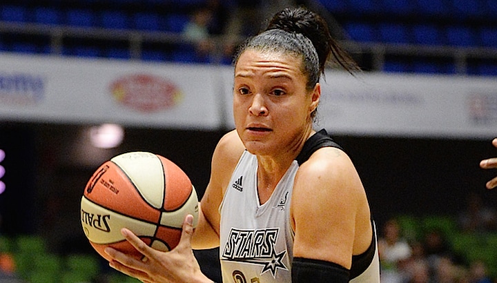 SAN ANTONIO, TX - JUNE 27: Kayla McBride #21 of the San Antonio Stars drives to the basket against the Seattle Storm during the game on June 27, 2015 at Freeman Coliseum in San Antonio, Texas. NOTE TO USER: User expressly acknowledges and agrees that, by downloading and or using this Photograph, user is consenting to the terms and conditions of the Getty Images License Agreement. Mandatory Copyright Notice: Copyright 2015 NBAE (Photo by D. Clarke Evans/NBAE via Getty Images)