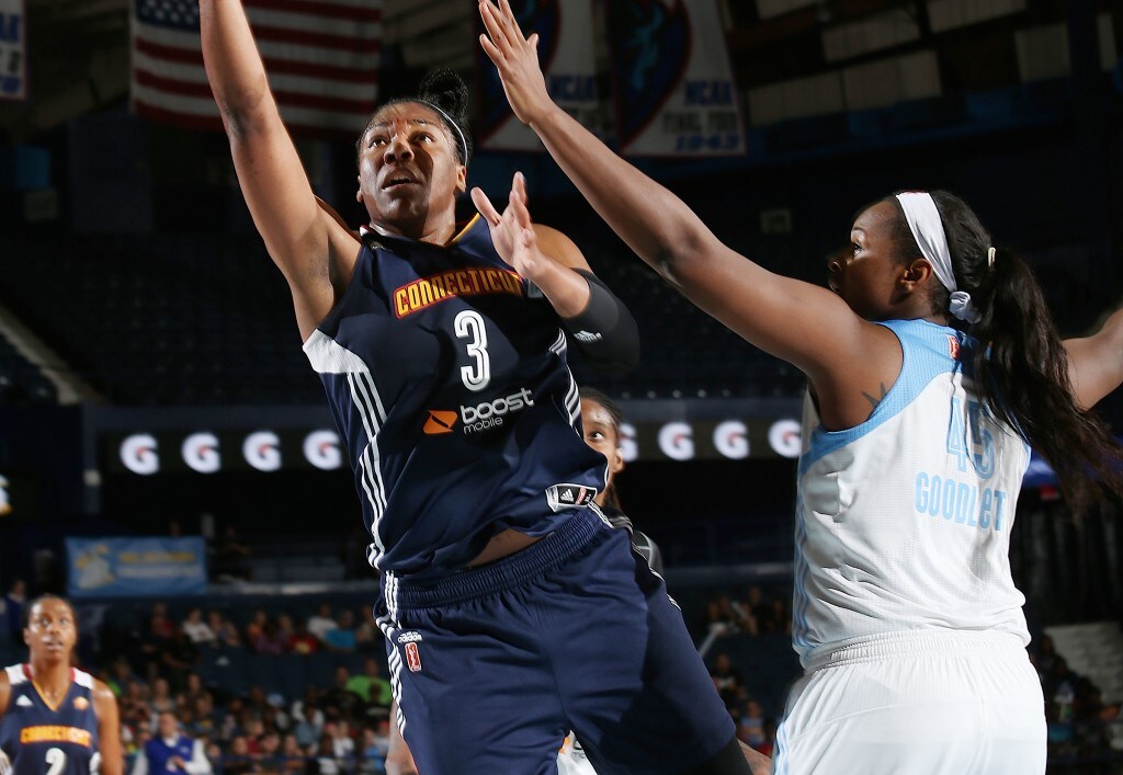 ROSEMONT, IL - JULY 12: Kelsey Bone #3 of the Connecticut Sun goes up for a shot against the Chicago Sky on July 12, 2015 at Allstate Arena in Rosemont, Illinois. NOTE TO USER: User expressly acknowledges and agrees that, by downloading and or using this Photograph, user is consenting to the terms and conditions of the Getty Images License Agreement. Mandatory Copyright Notice: Copyright 2015 NBAE (Photo by Gary Dineen/NBAE via Getty Images)
