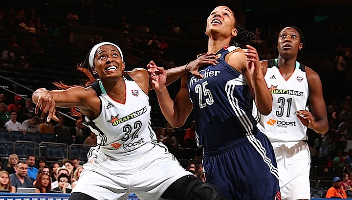 NEW YORK, NY - JULY 16: Swin Cash #32 of the New York Liberty looks for the rebound against Alyssa Thomas #25 of the Connecticut Sun during the game on July 16, 2015 at Madison Square Garden, New York City , New York.  NOTE TO USER: User expressly acknowledges and agrees that, by downloading and or using this Photograph, user is consenting to the terms and conditions of the Getty Images License Agreement. Mandatory Copyright Notice: Copyright 2015 NBAE (Photo by Nathaniel S. Butler/NBAE via Getty Images)