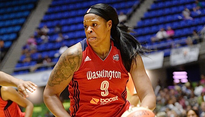 SAN ANTONIO - JULY 31: Kia Vaughn #9 of the Washington Mystics handles the ball against the San Antonio Stars in the WNBA game on July 31, 2015 at the Freeman Coliseum in San Antonio, Texas. NOTE TO USER: User expressly acknowledges and agrees that, by downloading and or using this photograph, user is consenting to the terms and conditions of the Getty Images License Agreement. Mandatory Copyright Notice: Copyright 2015 NBAE (Photos by D. Clarke Evans/NBAE via Getty Images)