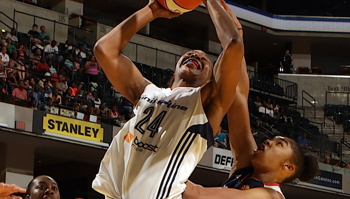 INDIANAPOLIS - AUGUST 2: Tamika Catchings #24 of the Indiana Fever attempts to shoot the ball against the Connecticut Sun on August 2, 2015 at Bankers Life Fieldhouse in Indianapolis, Indiana. NOTE TO USER: User expressly acknowledges and agrees that, by downloading and or using this Photograph, user is consenting to the terms and condition of the Getty Images License Agreement. Mandatory Copyright Notice: 2015 NBAE (Photo by Ron Hoskins/NBAE via Getty Images)