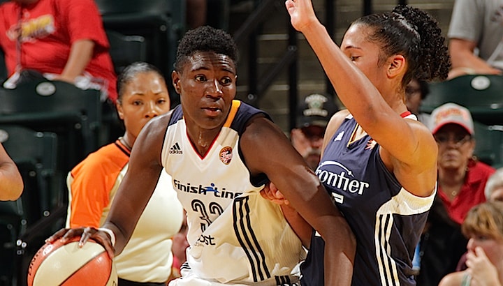INDIANAPOLIS - AUGUST 2: Natasha Howard #33 of the Indiana Fever handles the ball against the Connecticut Sun on August 2, 2015 at Bankers Life Fieldhouse in Indianapolis, Indiana. NOTE TO USER: User expressly acknowledges and agrees that, by downloading and or using this Photograph, user is consenting to the terms and condition of the Getty Images License Agreement. Mandatory Copyright Notice: 2015 NBAE (Photo by Ron Hoskins/NBAE via Getty Images)