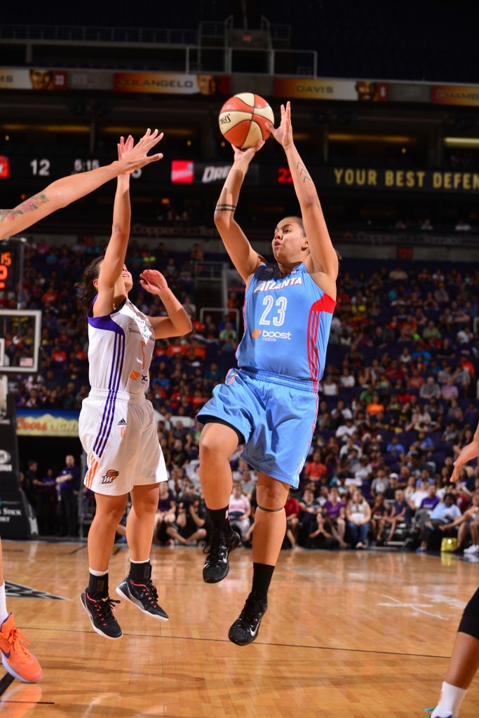 PHOENIX, AZ - JULY 14: Shoni Schimmel #23 of the Atlanta Dream shoots against Leilani Mitchell #5 of the Phoenix Mercury on July 14, 2015 at US Airways Center in Phoenix, Arizona. NOTE TO USER: User expressly acknowledges and agrees that, by downloading and or using this Photograph, user is consenting to the terms and conditions of the Getty Images License Agreement. Mandatory Copyright Notice: Copyright 2015 NBAE (Photo by Barry Gossage/NBAE via Getty Images)