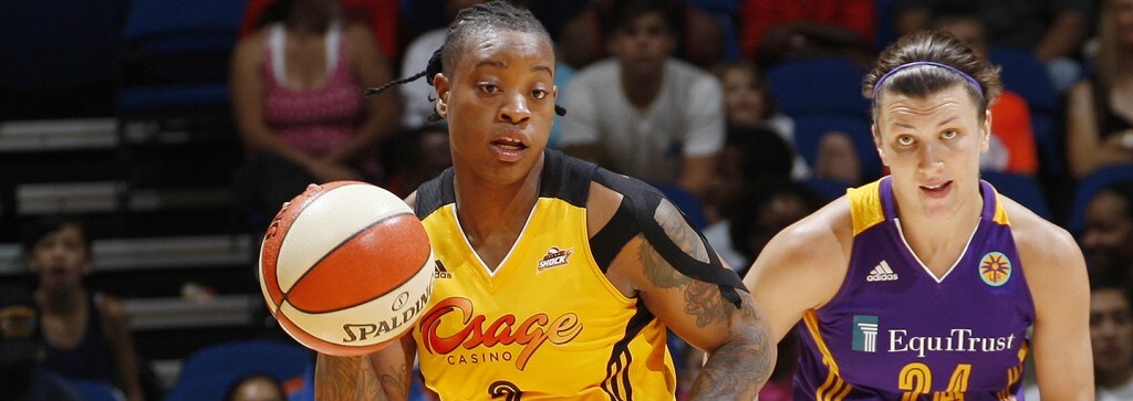 Riquna Williams of the Tulsa Shock handles the ball against the Los Angeles Sparks on Saturday.