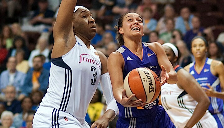 UNCASVILLE, CT - AUGUST 27: Leilani Mitchell #5 of the Phoenix Mercury shoots the ball against Kelsey Bone #3 of the Connecticut Sun on August 27, 2015 at the Mohegan Sun Arena in Uncasville, Connecticut. NOTE TO USER: User expressly acknowledges and agrees that, by downloading and/or using this Photograph, user is consenting to the terms and conditions of the Getty Images License Agreement. Mandatory Copyright Notice: Copyright 2015 NBAE (Photo by Stephen Pellegrino/NBAE via Getty Images)