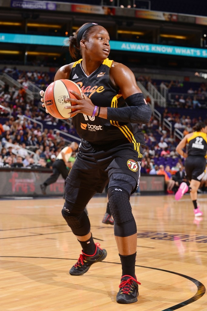 PHOENIX, AZ - AUGUST 4: Karima Christmas #13 of the Tulsa Shock handles the ball against the Phoenix Mercury on August 4, 2015 at US Airways Center in Phoenix, Arizona. NOTE TO USER: User expressly acknowledges and agrees that, by downloading and or using this Photograph, user is consenting to the terms and conditions of the Getty Images License Agreement. Mandatory Copyright Notice: Copyright 2015 NBAE (Photo by Barry Gossage/NBAE via Getty Images)