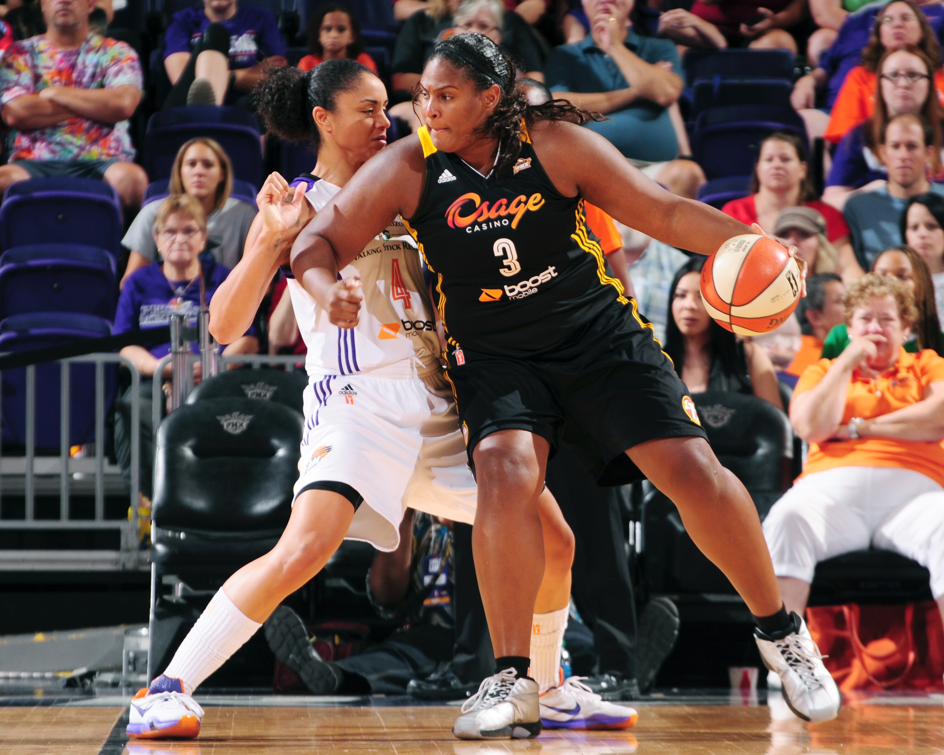 PHOENIX, AZ - AUGUST 4: Courtney Paris #3 of the Tulsa Shock handles the ball against the Phoenix Mercury on August 4, 2015 at US Airways Center in Phoenix, Arizona. NOTE TO USER: User expressly acknowledges and agrees that, by downloading and or using this Photograph, user is consenting to the terms and conditions of the Getty Images License Agreement. Mandatory Copyright Notice: Copyright 2015 NBAE (Photo by Barry Gossage/NBAE via Getty Images)