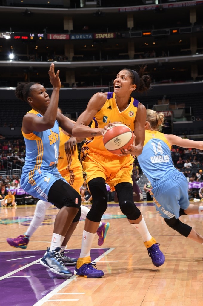 LOS ANGELES, CA - AUGUST 16: Candace Parker #3 of the Los Angeles Sparks handles the ball against Clarissa Dos Santos #8 of the Chicago Sky on August 16, 2015 at Staples Center in Los Angeles, California. NOTE TO USER: User expressly acknowledges and agrees that, by downloading and or using this Photograph, user is consenting to the terms and conditions of the Getty Images License Agreement. Mandatory Copyright Notice: Copyright 2015 NBAE (Photo by Adam Pantozzi/NBAE via Getty Images)