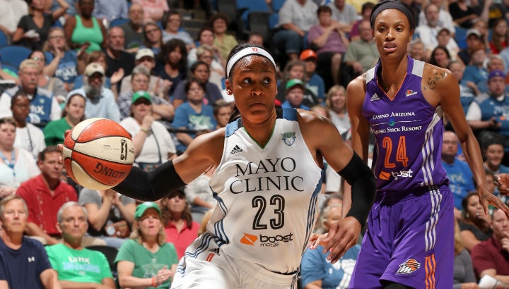 Maya Moore #23 of the Minnesota Lynx handles the ball against the Phoenix Mercury