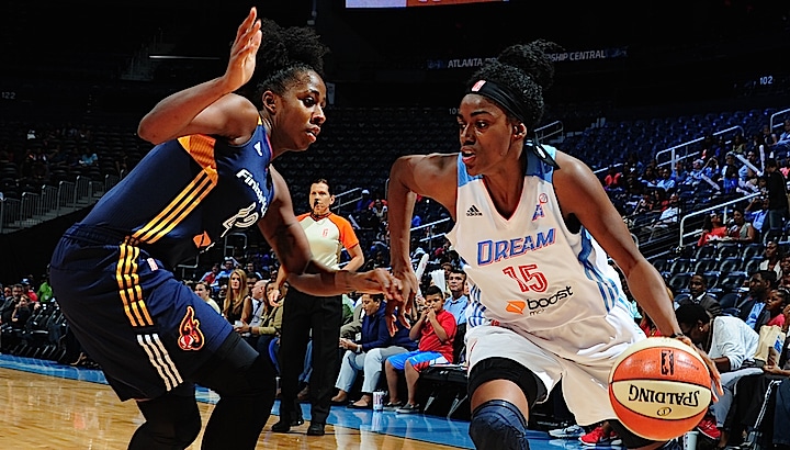 ATLANTA, GA - SEPTEMBER 11: Tiffany Hayes #15 of the Atlanta Dream drives to the basket against Shenise Johnson #42 of the Indiana Fever on September 11, 2015 at Philips Arena in Atlanta, Georgia. NOTE TO USER: User expressly acknowledges and agrees that, by downloading and/or using this Photograph, user is consenting to the terms and conditions of the Getty Images License Agreement. Mandatory Copyright Notice: Copyright 2015 NBAE (Photo by Scott Cunningham/NBAE via Getty Images)