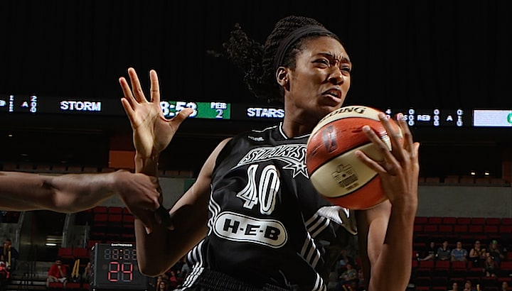 SEATTLE, WA - SEPTEMBER 13: Kayla Alexander #40 of the San Antonio Stars grabs the rebound against the Seattle Storm on September 13, 2015 at Key Arena in Seattle, Washington. NOTE TO USER: User expressly acknowledges and agrees that, by downloading and/or using this Photograph, user is consenting to the terms and conditions of Getty Images License Agreement. Mandatory Copyright Notice: Copyright 2015 NBAE (Photo by Joshua Huston/NBAE via Getty Images)