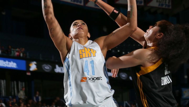 Erika De Souza #41 of the Chicago Sky shoots against Amanda Zahui B. #32 of the Tulsa Shock