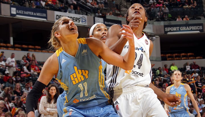 Elena Delle Donne (11 points) and Tamika Catchings battle under the basket in Game 2 of the Eastern Conference semifinals. (Ron Hoskins/NBAE/Getty Images)