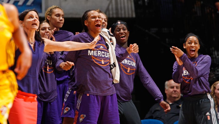 The Mercury bench celebrates a sweep of the Shock to advance to the Western Conference finals. (Shane Bevel/NBAE/Getty Images)