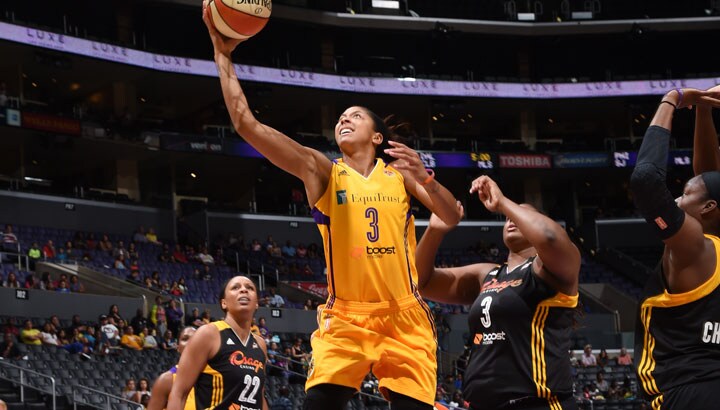Candace Parker finished with 33 points against the Shock as the Sparks secured a playoff spot.