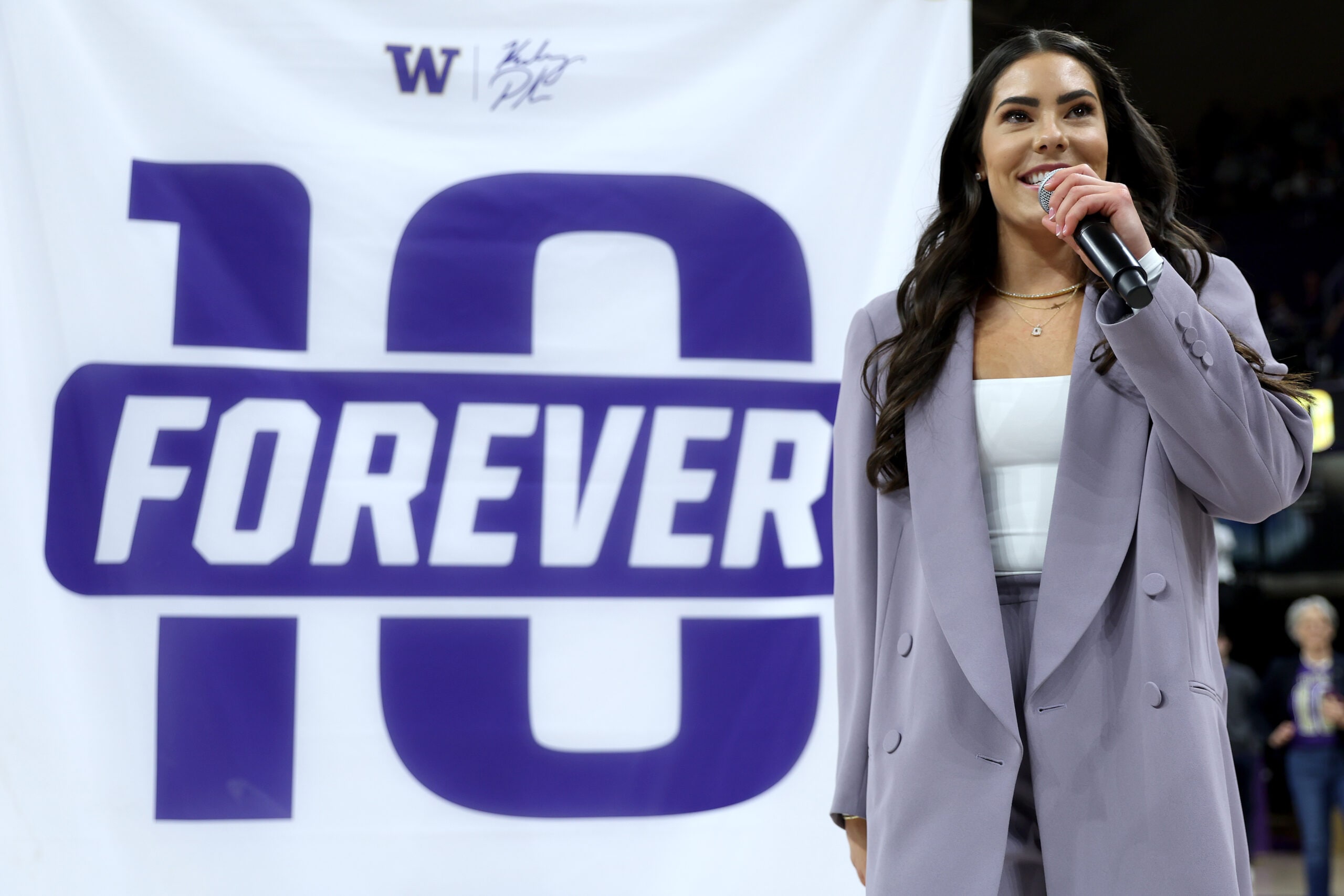 Former Washington Huskies women’s basketball player Kelsey Plum reacts during her #10 jersey retirement ceremony during halftime between the Washington Huskies Purdue Boilermakers