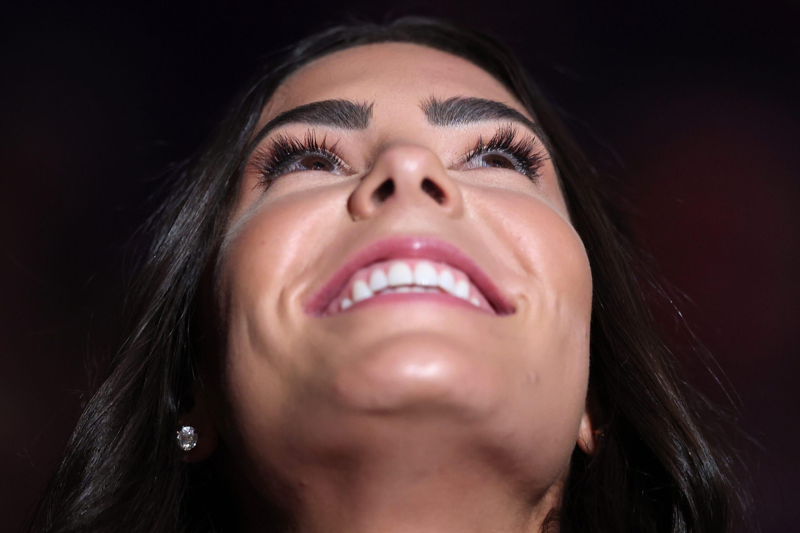 Kelsey Plum smiles during her #10 jersey retirement ceremony
