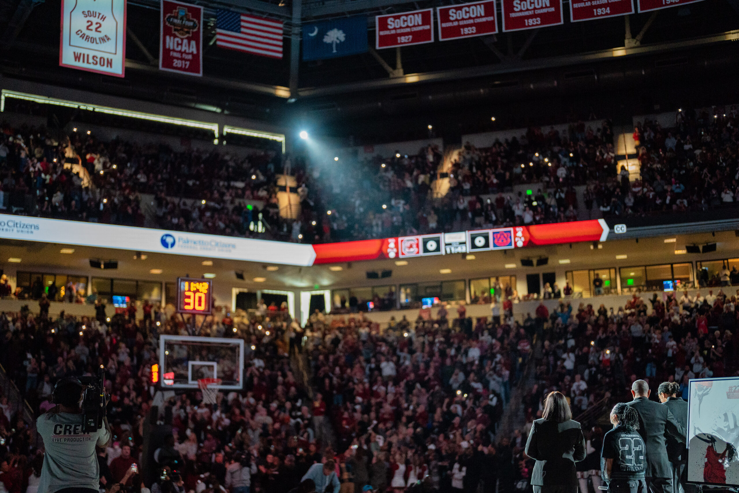 A'ja Wilson looks on during her jersey retirement ceremony
