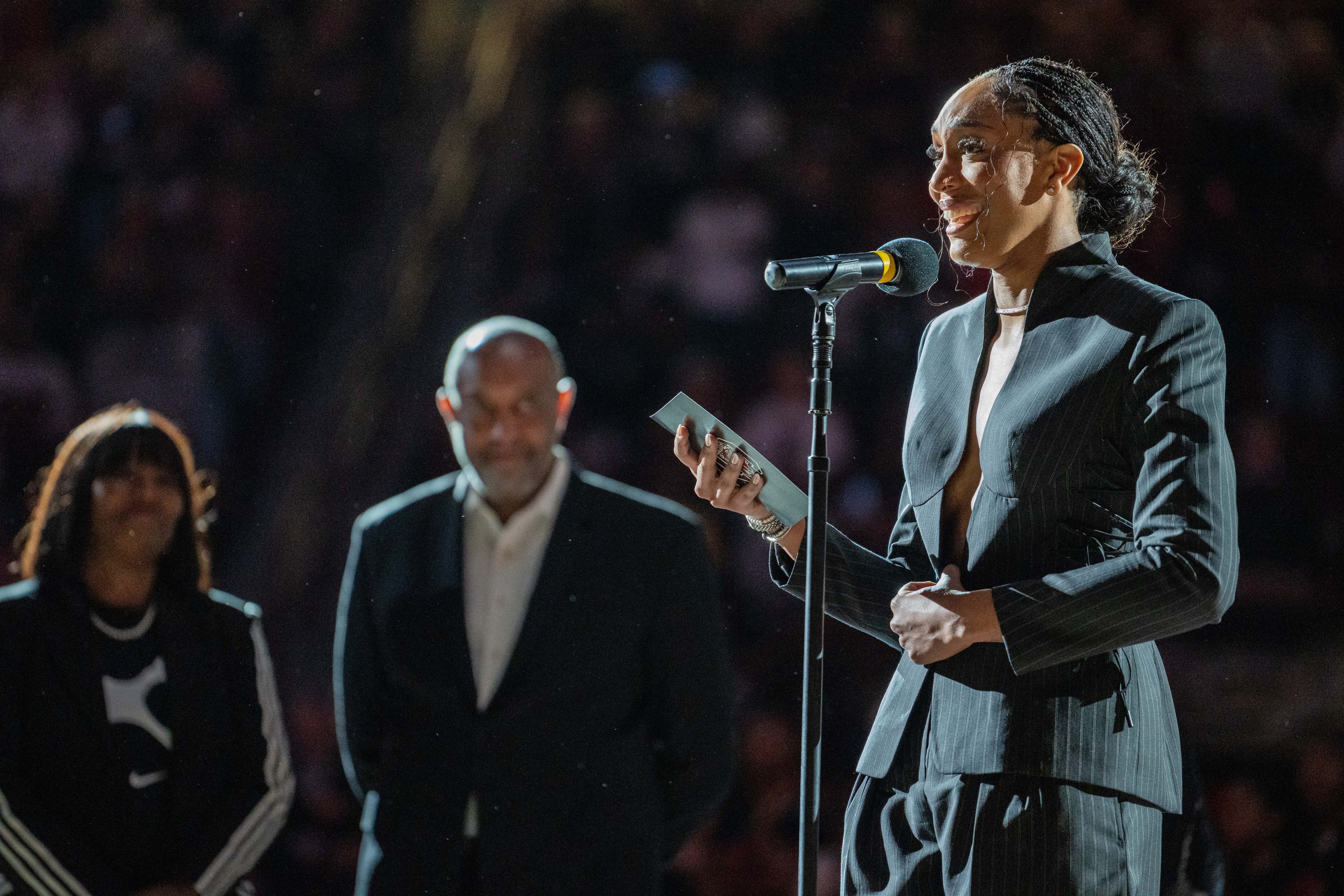 A'ja Wilson speaks to the crowd during her jersey retirement ceremony