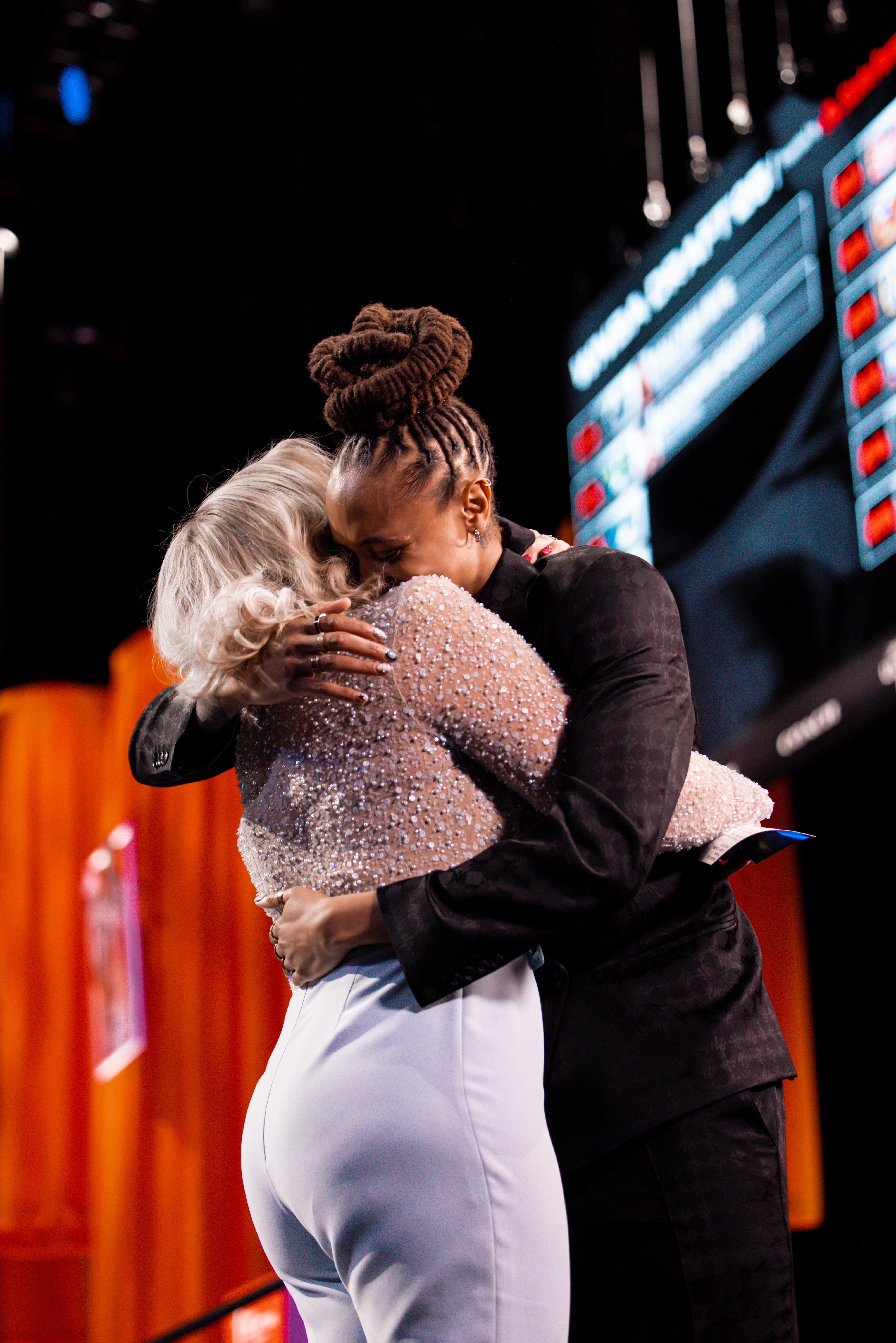 Madison Scott hugging Holly Rowe at the 2025 WNBA Draft