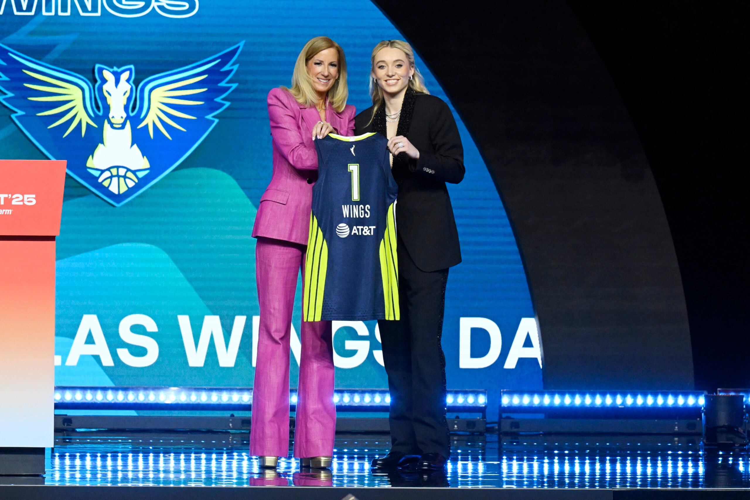 Paige Buekers poses for a picture with Commissioner Cathy Engelbert of the WNBA after being drafted as first-round overall pick by the Dallas Wings during the 2025 WNBA Draft on April 14, 2025, at The Shed in New York, New York