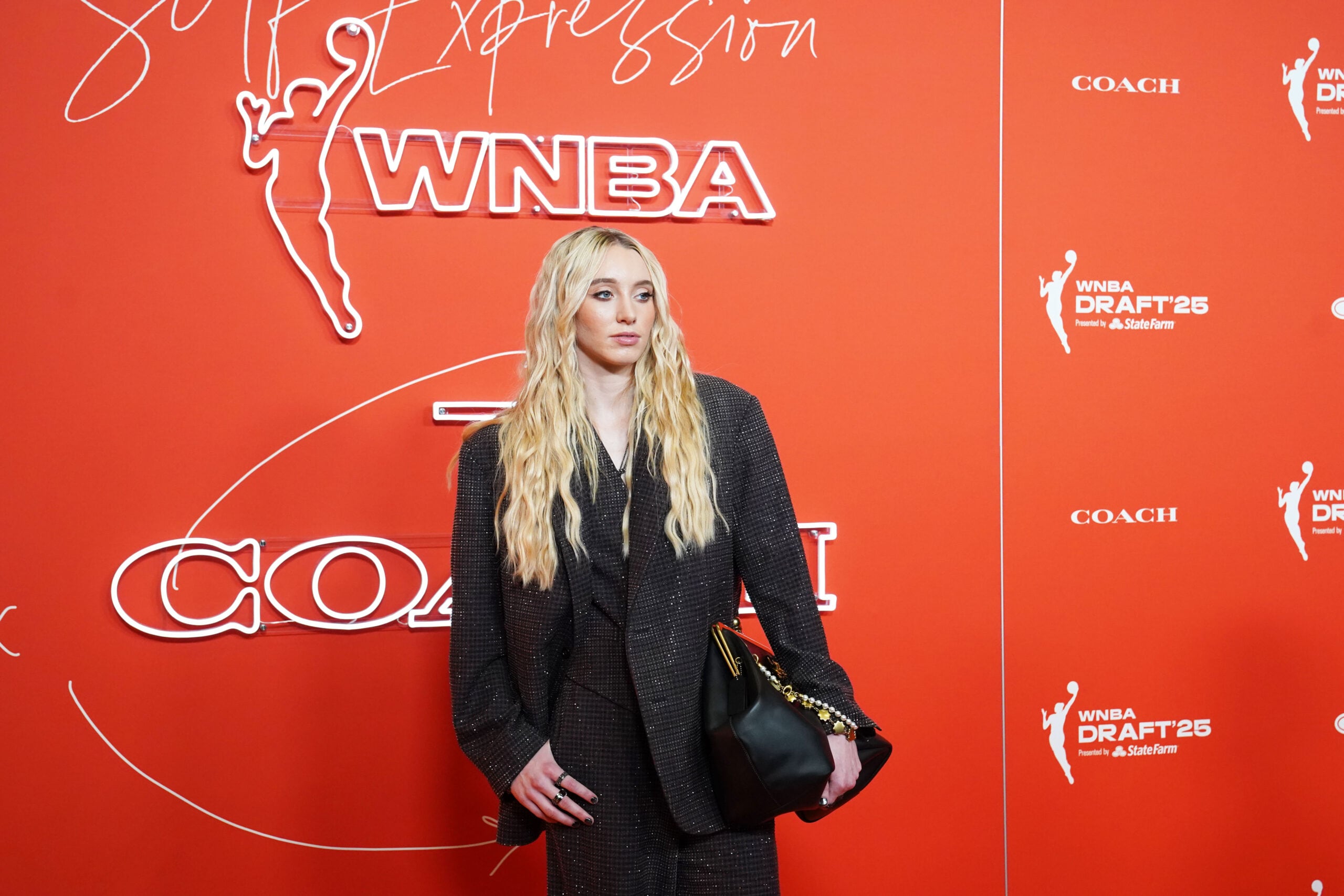 Paige Bueckers walks the orange carpet ahead of the 2025 WNBA Draft.