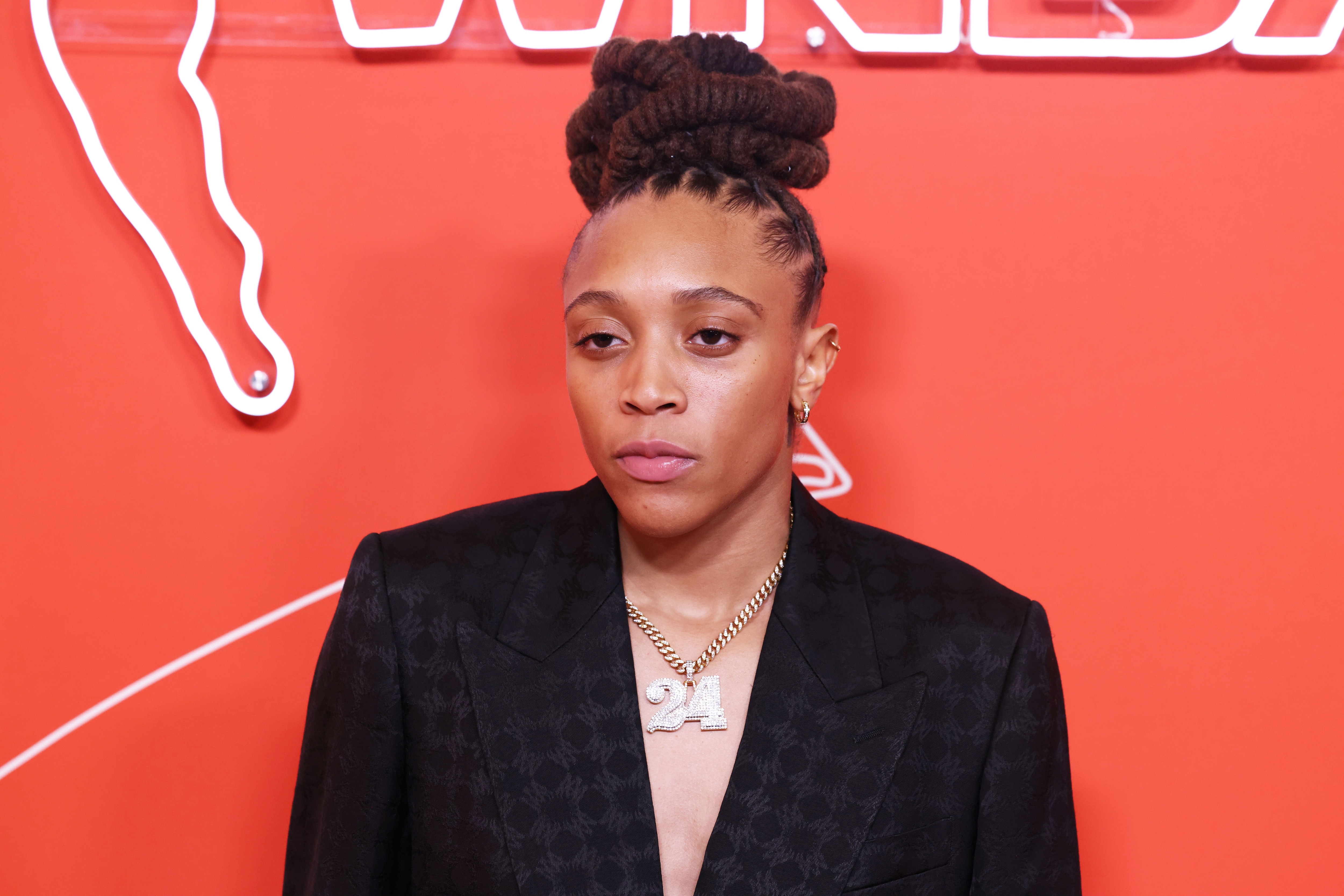 Madison Scott walks the orange carpet ahead of the 2025 WNBA Draft.
