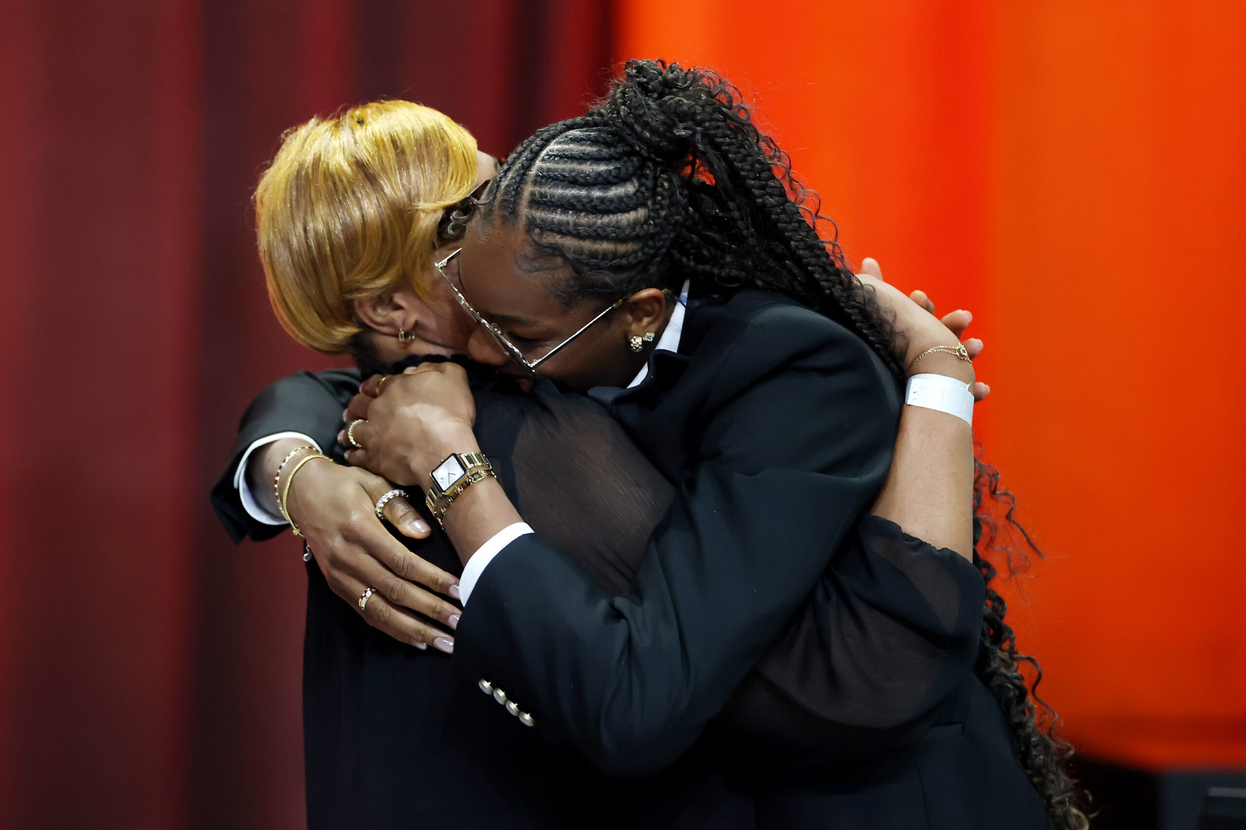 Dominique Malonga hugs family after being selected with the second overall pick by the Seattle Storm during the 2025 WNBA Draft at The Shed on April 14, 2025 in New York City.
