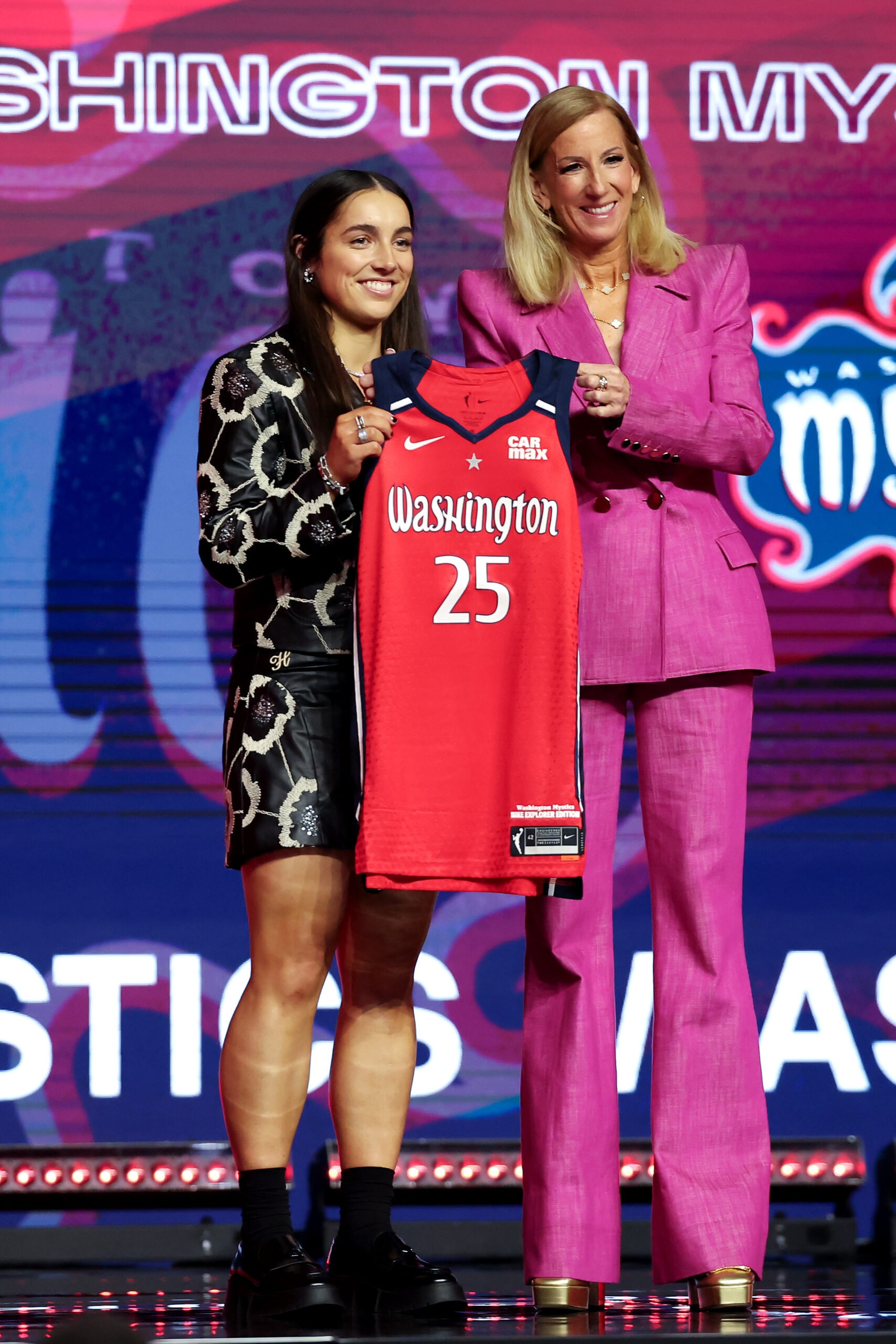 Georgia Amoore poses for a photo with WNBA Commissioner Cathy Engelbert after being selected with the sixth overall pick by the Washington Mystics during the 2025 WNBA Draft at The Shed on April 14, 2025 in New York City.