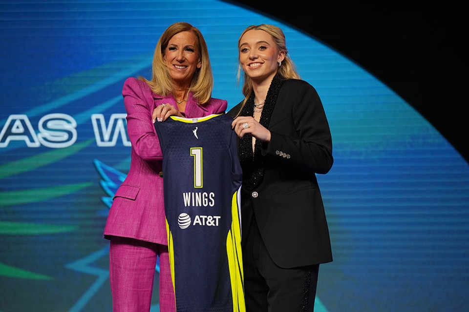 Paige Bueckers poses with WNBA Commissioner Cathy Engelbert after being selected No. 1 in the 2025 WNBA Draft