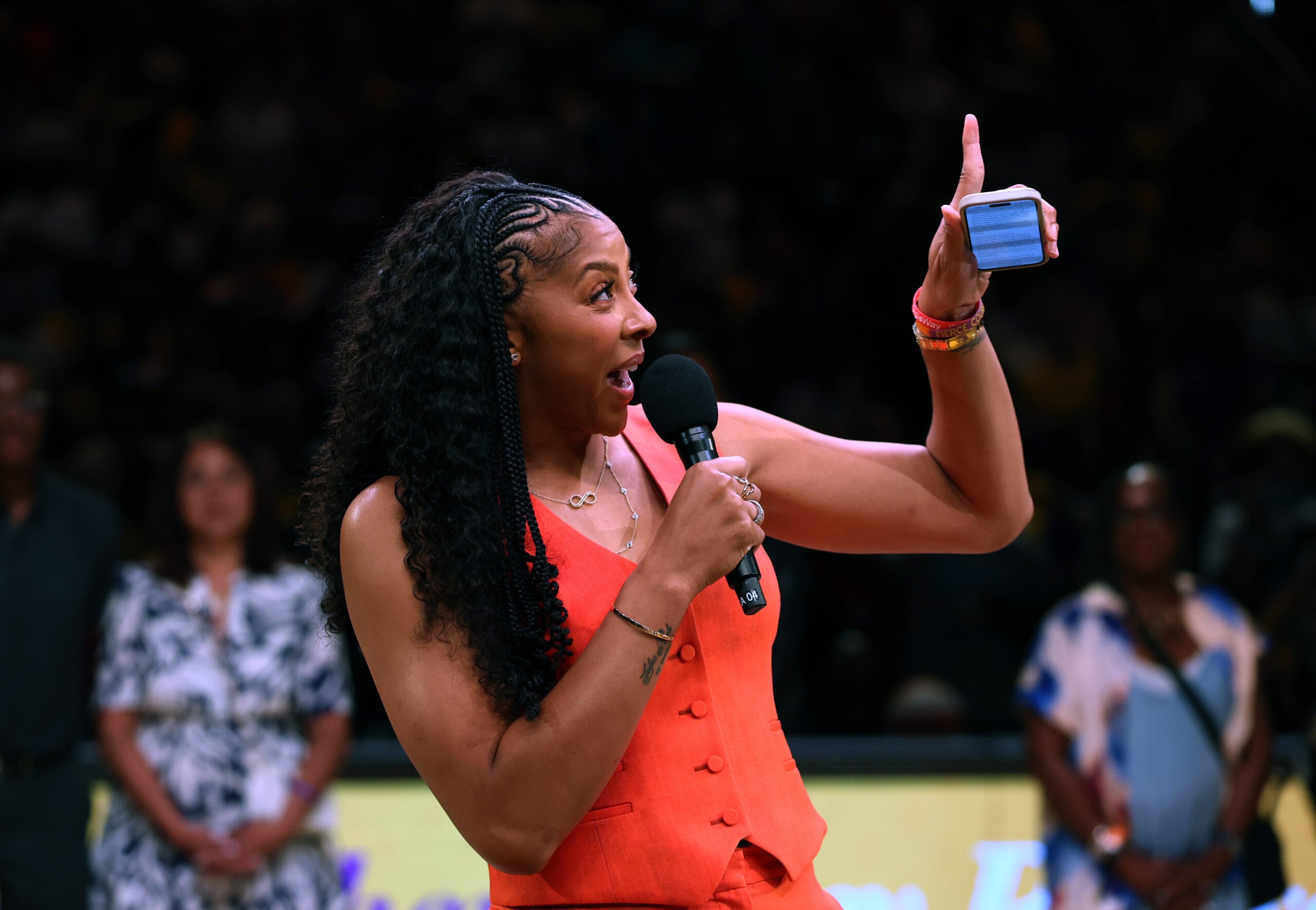 Candace Parker speaks during her jersey retirement ceremony