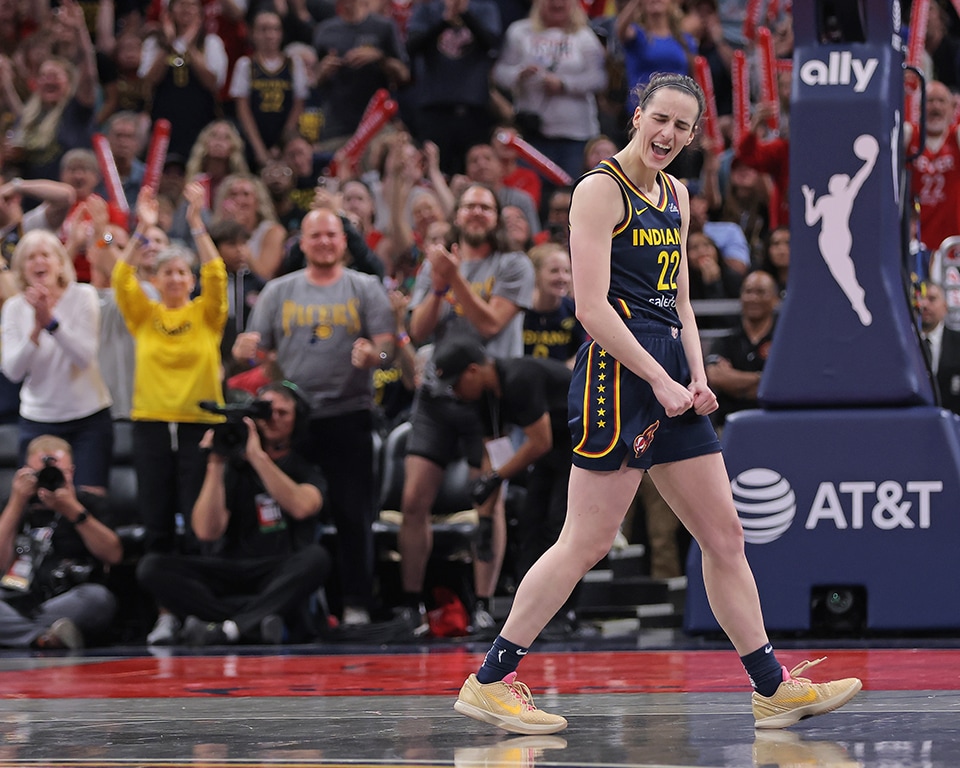 #22 Caitlin Clark of the Indiana Fever celebrating after a three-pointer